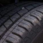 A tread is the rubber on the outer circumference of a tire that makes contact with the road and provides traction.