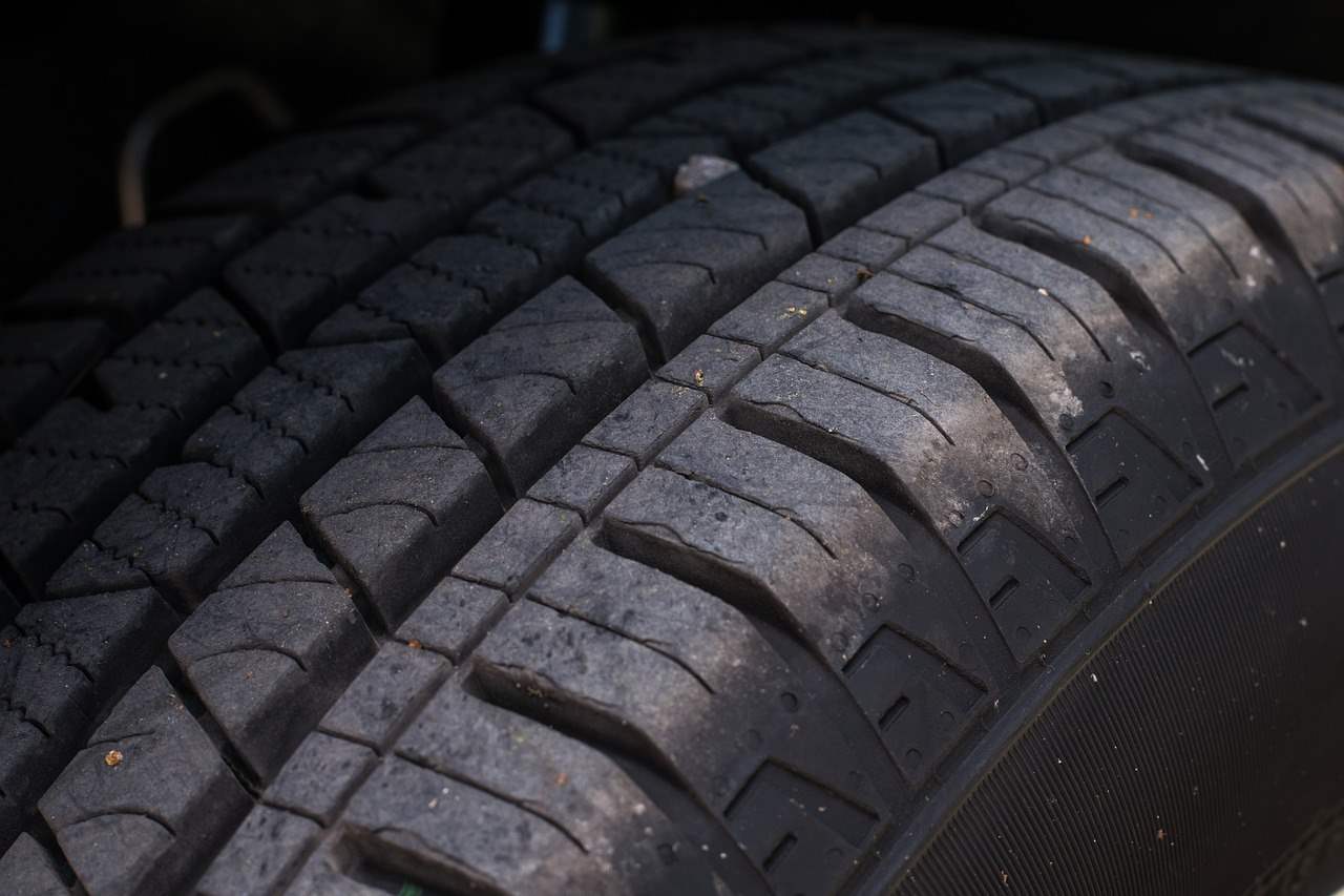 A tread is the rubber on the outer circumference of a tire that makes contact with the road and provides traction.