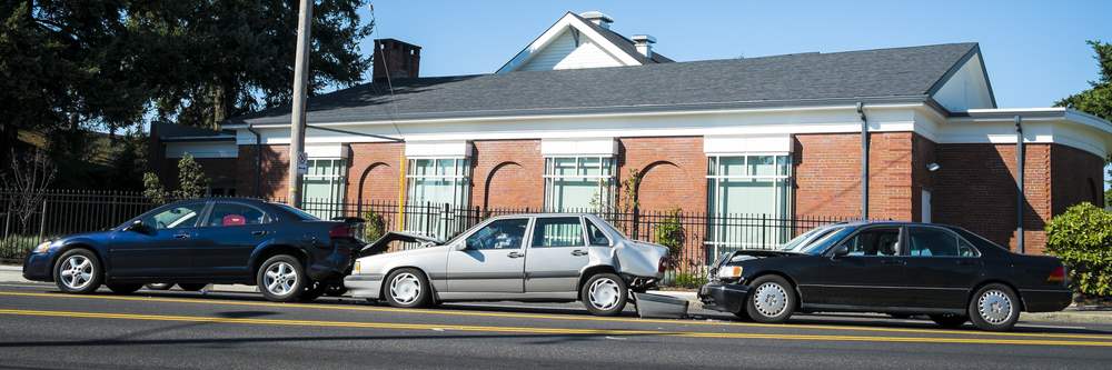 three cars in rear end collision